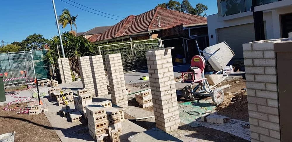 Brick piers under construction