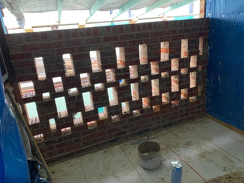 Feature brick wall hit and miss pattern