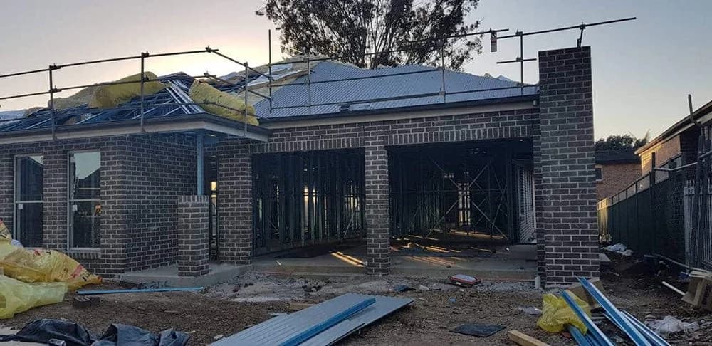 New brick home construction front