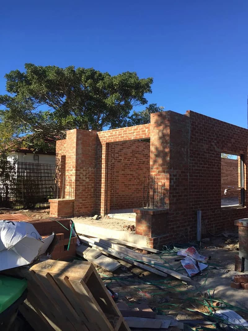 Red brick structure under construction