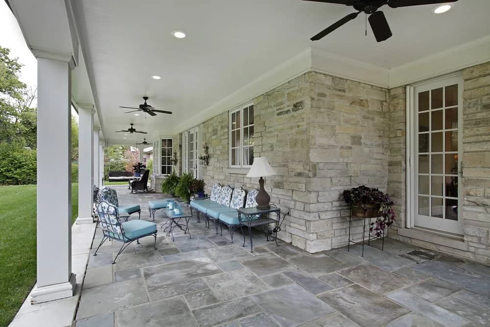 Stone wall covered veranda patio